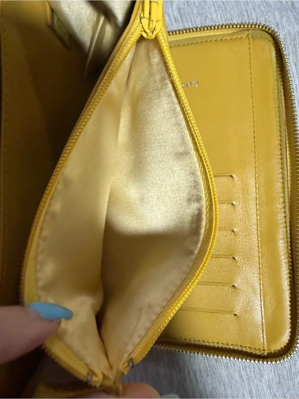 CHANEL Yellow Quilted Zip Around Wallet